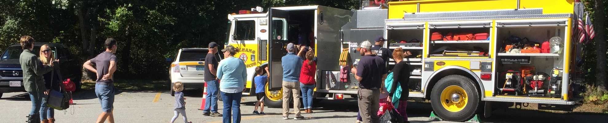 People visiting fire truck